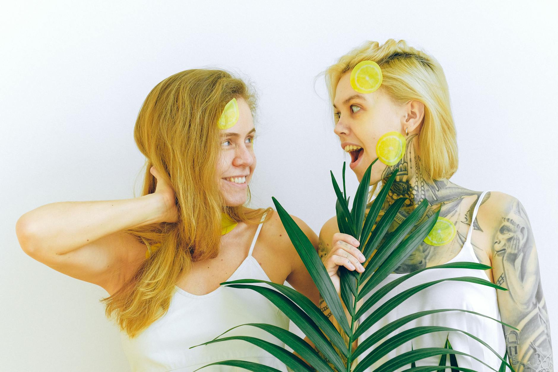 Two fresh lemons on a white background, representing the Lem vibrator's citrus design and fresh approach to arousal after forty